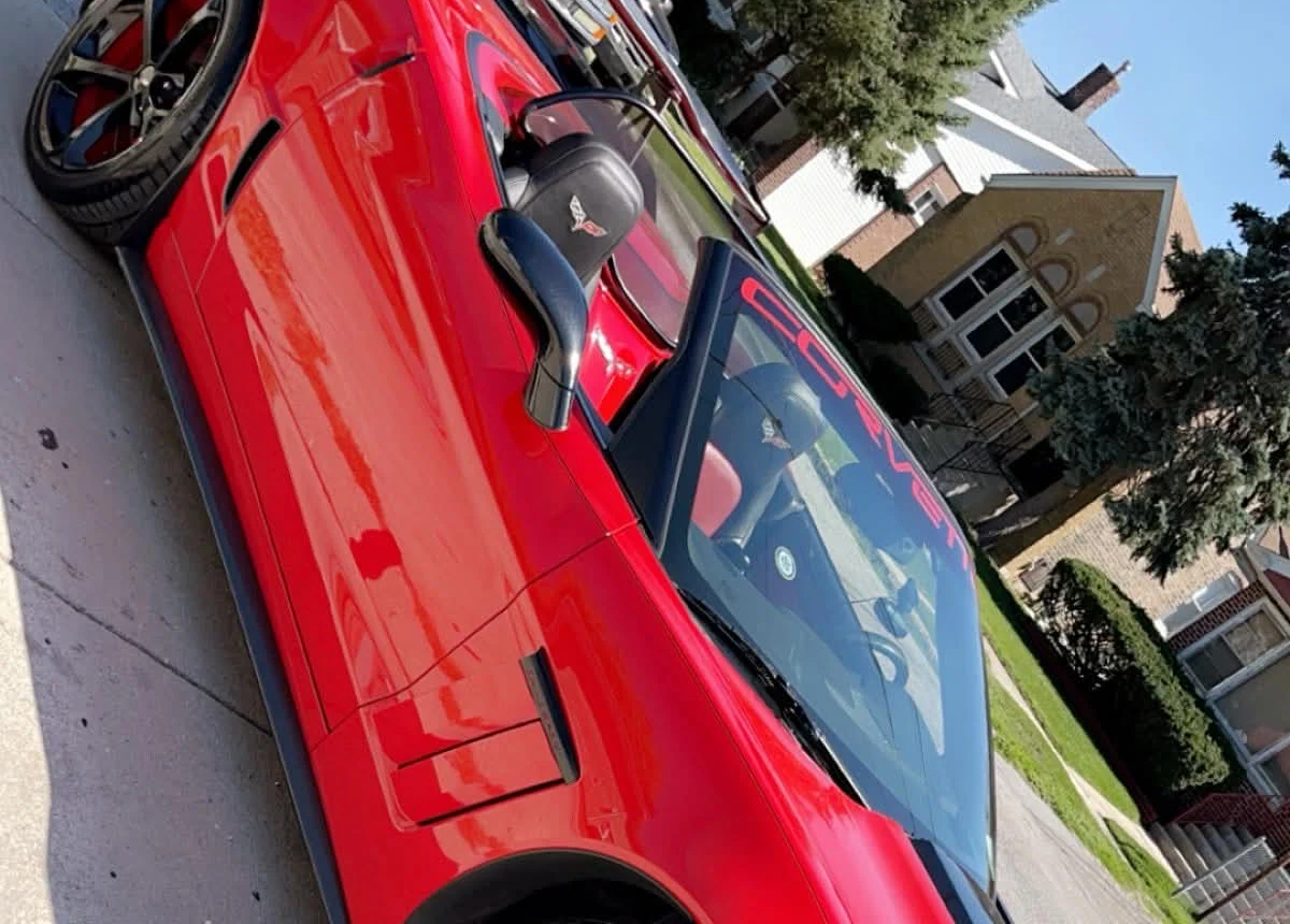 Glossy red Corvette after a quick exterior detail and hand wash