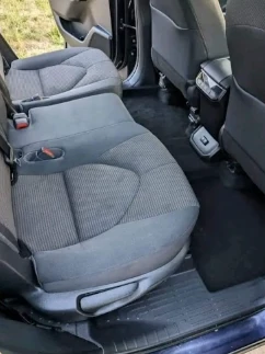Back seat and floor after interior cleaning with debris removed