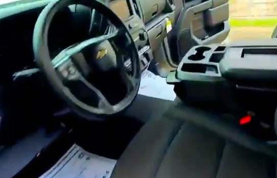 Freshly cleaned truck interior with detailed dashboard, console, and front seats