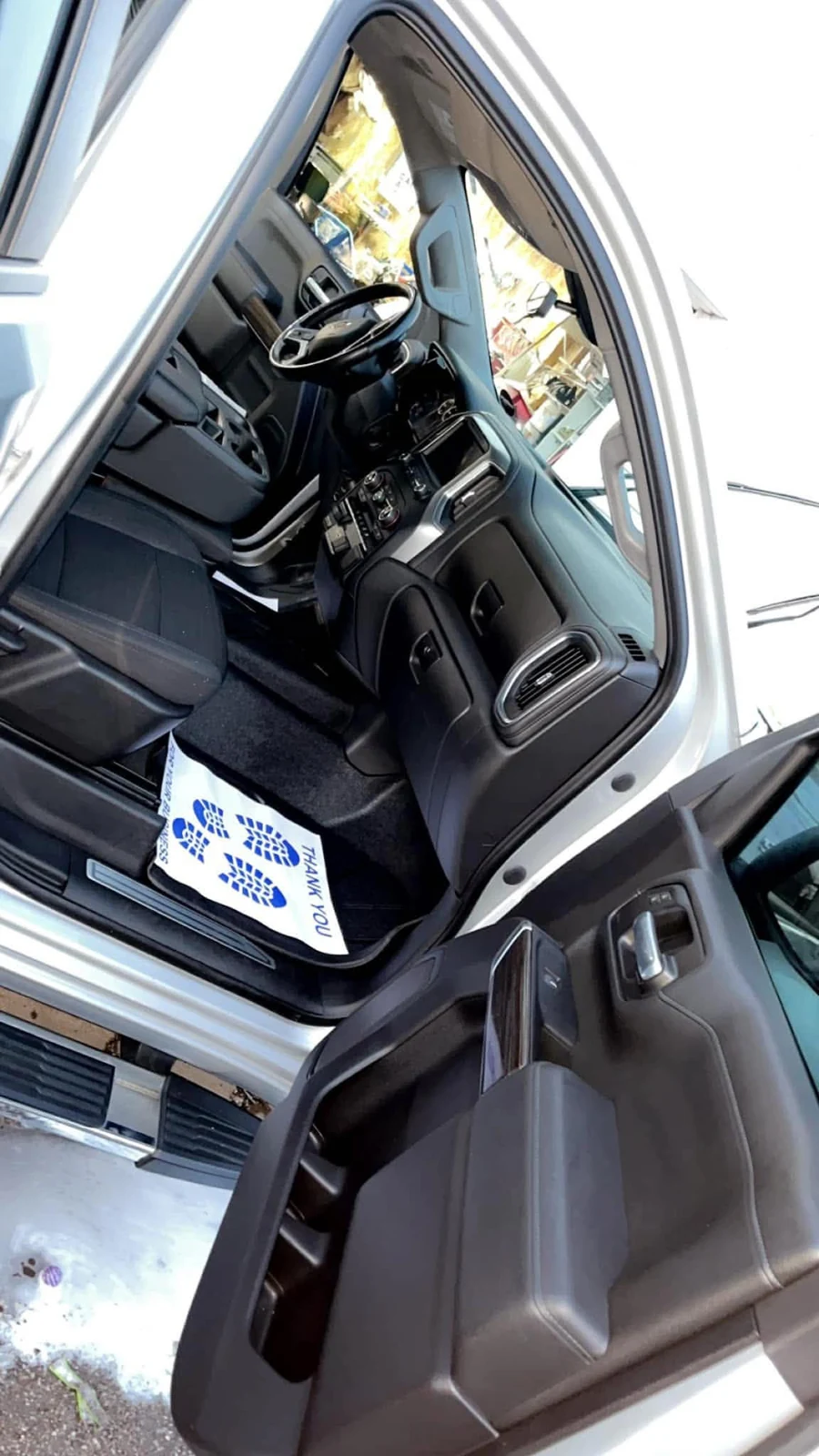 Passenger seat area after interior cleanup on a silver pickup